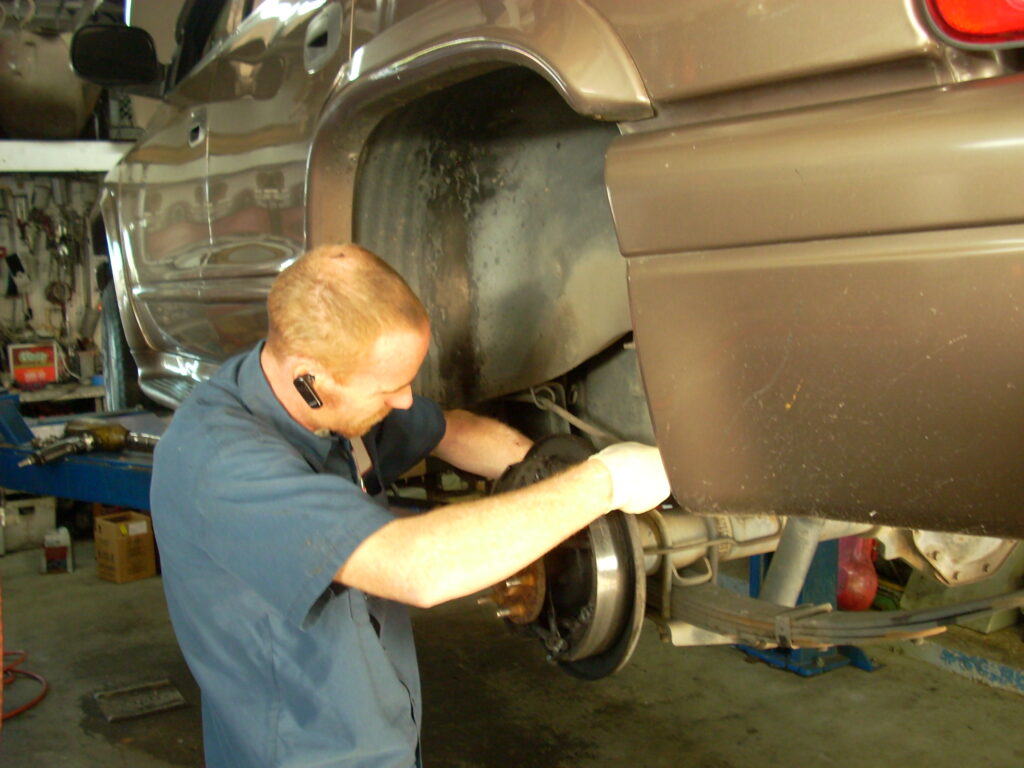 mechanic fixing brakes