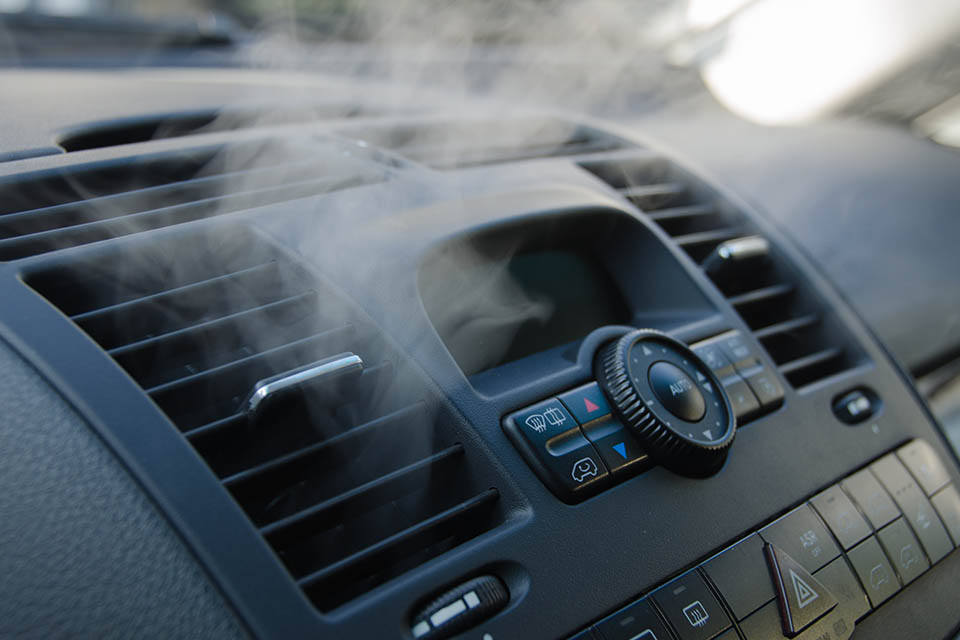 The process of cleaning car air conditioning. The air flow inside the car. Detail interior of car